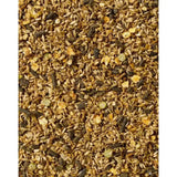 A mix of golden brown and dark brown grains and seeds in saracen competition fit performance horses fibre mix