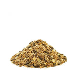 A mound of saracen competition fit mix with brown and tan grains chopped veggies and dark pellets for performance horse’s fibre