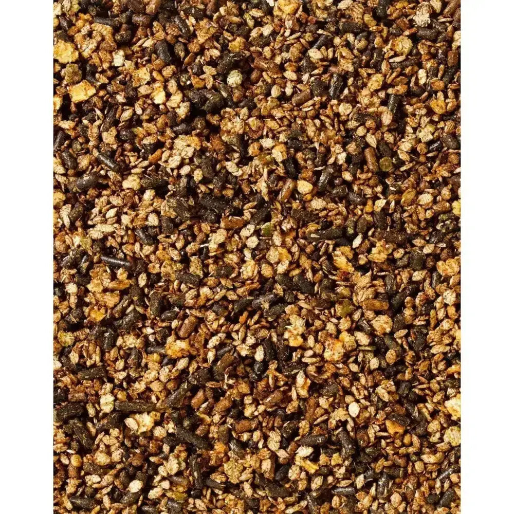 A mix of dark brown and golden granola clusters with oats and seeds in saracen condition improver mix for coat condition