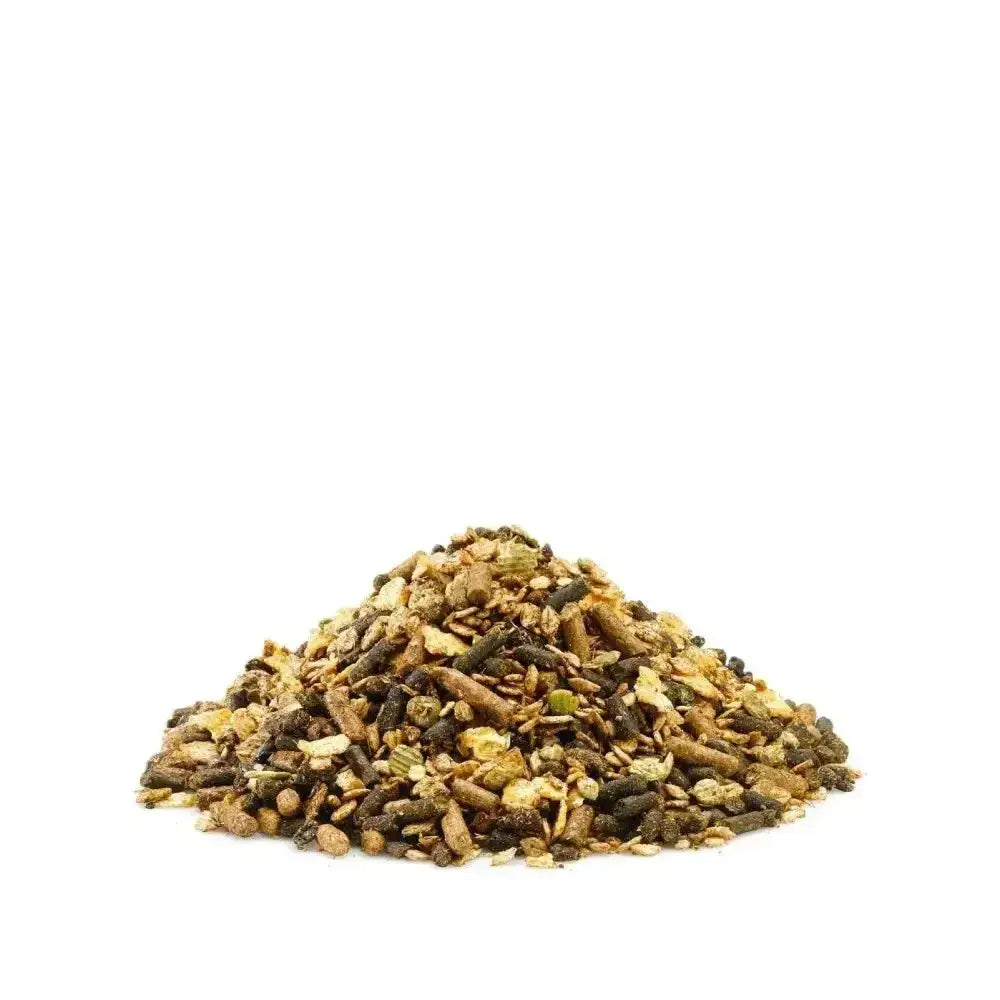 A mound of brown green and beige pellets of saracen cooling mix pony cooling mix for horses to stay cool