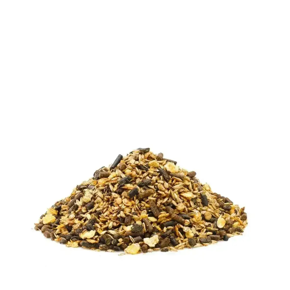 A mound of brown and tan grains seeds and chopped veggies from saracen enduro-performance with chelated minerals for equine athletes