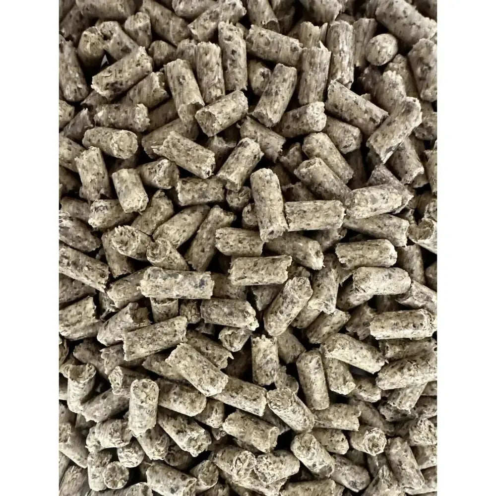 Gray cylindrical animal feed pellets with rough texture in saracen veteran mash for malted flavour and nutritional support