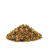 A mound of brown and green granular saracen veteran mix pet food with varied textures in a highly digestible mix designed specifically