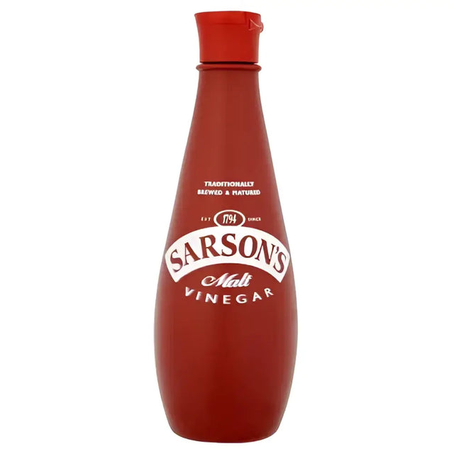 A red plastic bottle of sarsons malt vinegar with a matching red cap and white labeling for cooking use