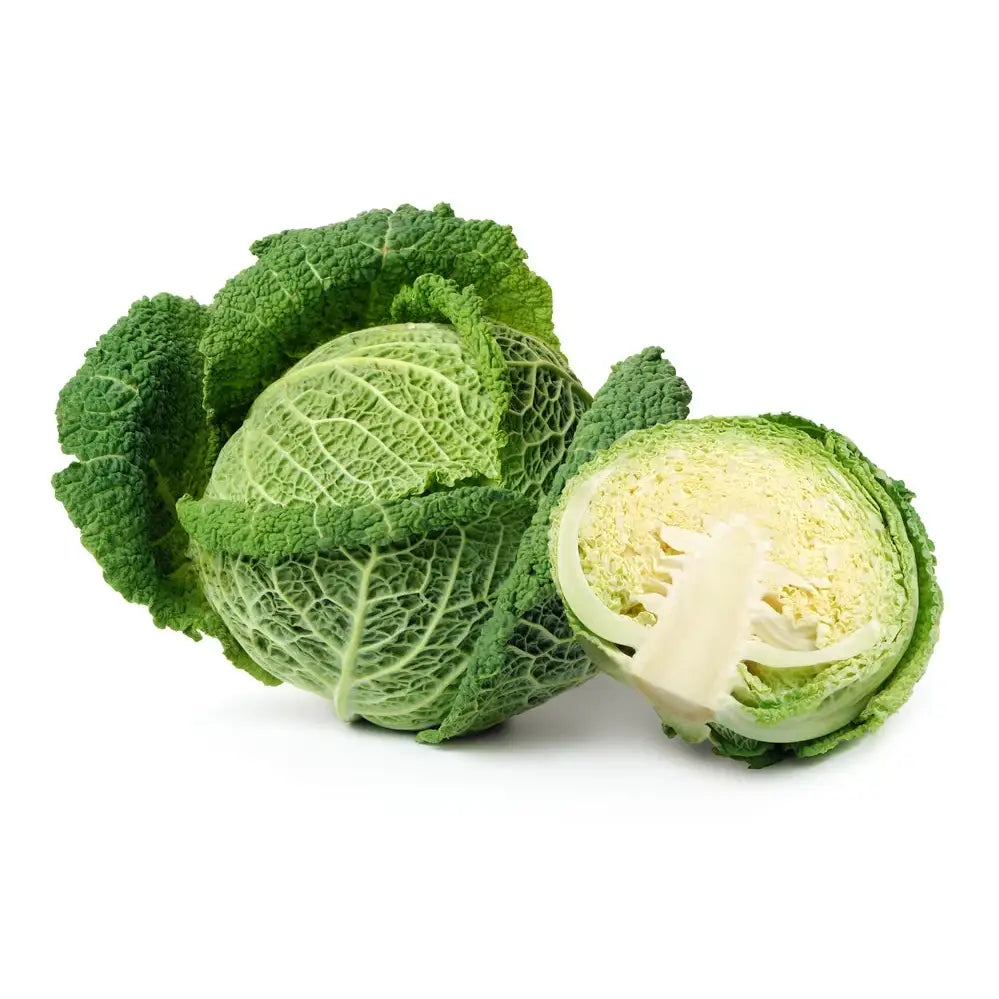 A whole green savoy cabbage with crinkled leaves and a cut half showing its pale core perfect for fresh meals or equestrian diets