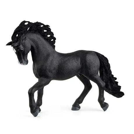Black plastic model of schleich pura raza española stallion with detailed mane and tail in friesian style