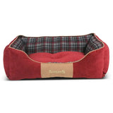 Red corduroy scruffs highland box bed with plaid interior and tan leather patch made from rich chenille fabric