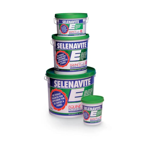 Stacked containers of selenavite e green and white pony feed supplement with micronutrients including trace elements for horses