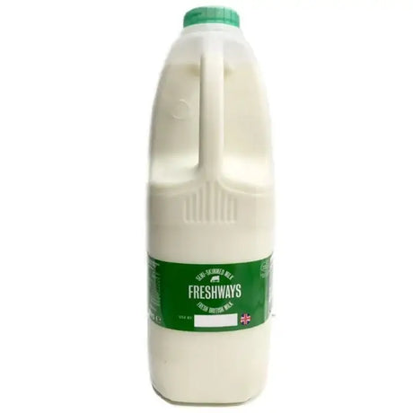 A translucent plastic bottle of semi skimmed milk freshways with a green cap and label filled with white milk cotteswold