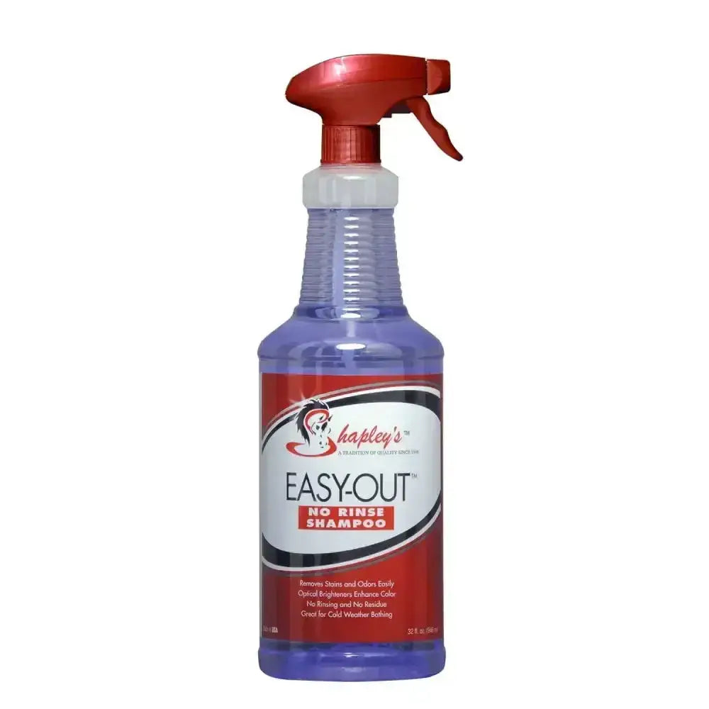 A purple plastic spray bottle with red trigger nozzle labeled shapleys easy-out no rinse shampoo for minute clean ups on horses coat