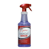 A purple plastic spray bottle with red trigger nozzle labeled shapleys easy-out no rinse shampoo for minute clean ups on horses coat