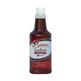 A dark amber plastic bottle with white spray nozzle for shapley’s equitone colour enhancing shampoo that enhances natural colour