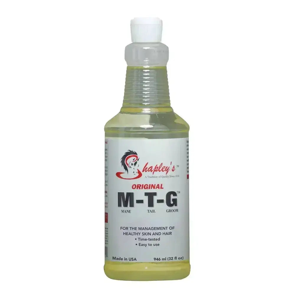 A clear plastic spray bottle with pale yellow original m-t-g liquid for tail hair and healthy skin by shapleys