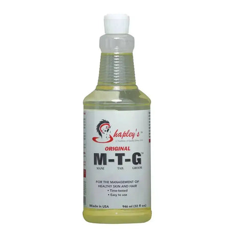 A clear plastic spray bottle with pale yellow original m-t-g liquid for tail hair and healthy skin by shapleys