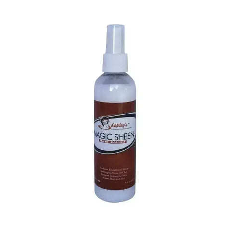 A clear plastic spray bottle with a white nozzle labeled shapley’s magic sheen hair polish to reduce grooming time and add sheen coat shine