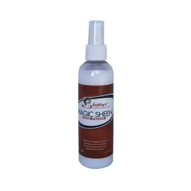 A clear plastic spray bottle with a white nozzle labeled shapley’s magic sheen hair polish to reduce grooming time and add sheen coat shine