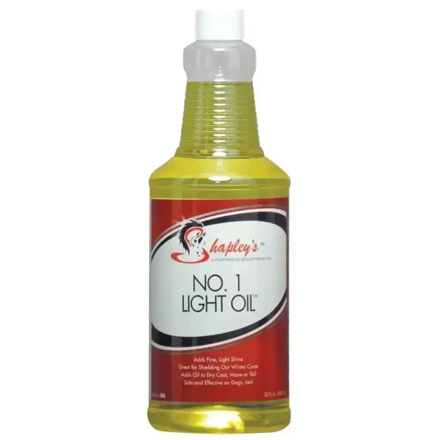 A clear plastic spray bottle filled with yellow shapleys no1 light oil coat for a smooth oil coat shine