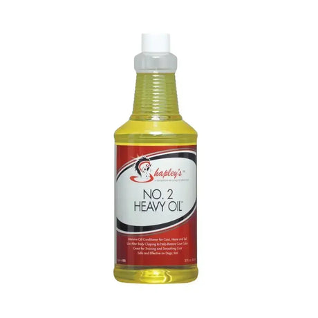 A clear plastic spray bottle of hapleys no 2 heavy oil filled with yellow liquid for intensive oil treatment and deep conditioning oil