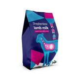 A vibrant blue and pink geometrically designed bag of shepherdess lamb milk powder with stylized sheep illustration