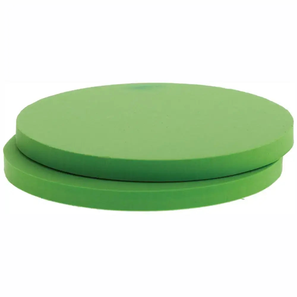 Two stacked circular green foam pads of shoof tubbease sole inserts for comfy tubbease sole support