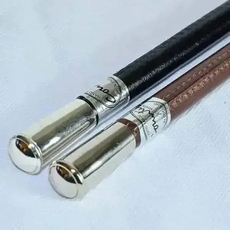 Showing cane chrome twig leather walking sticks with black and brown leather shanks and silver super smart finish caps