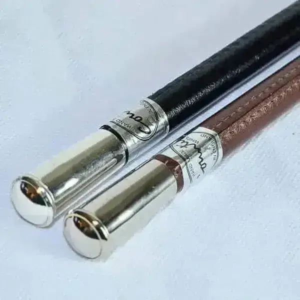 Showing cane chrome twig leather walking sticks with black and brown leather shanks and silver super smart finish caps