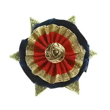 A showquest buttonholes newport star-shaped layer rosette pin with navy velvet red gold fabric and ornate gold center