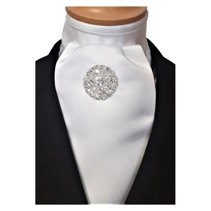 A sparkling silver rhinestone brooch on a crisp white showquest estelle stock ready-tied cravat