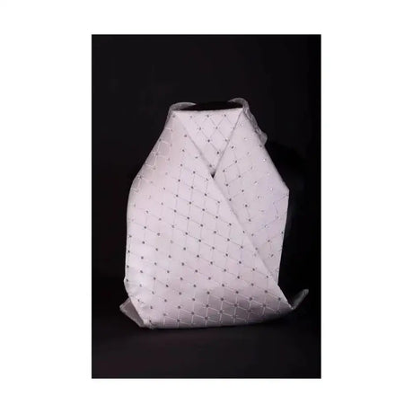 White quilted backpack with silver metallic studs from showquest tied samlesbury jacquard weave stock collection