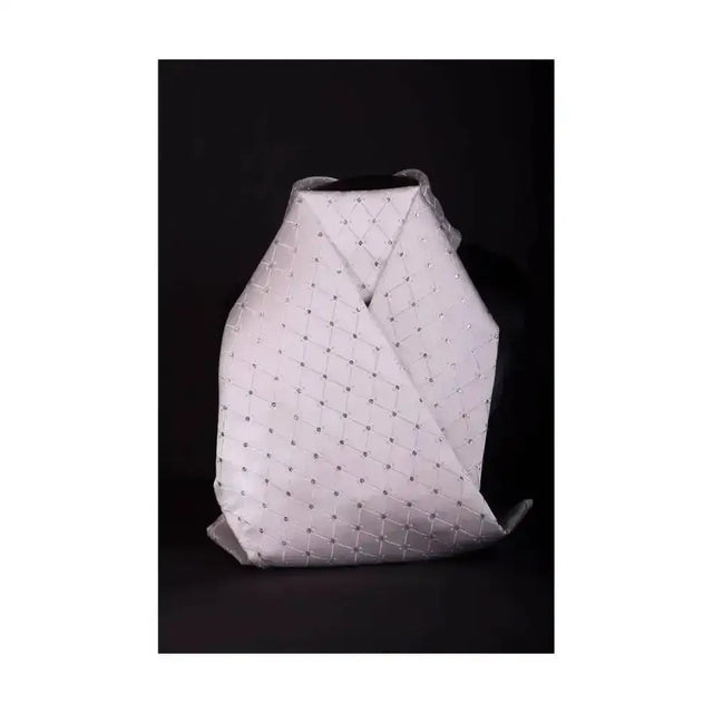 White quilted backpack with silver metallic studs from showquest tied samlesbury jacquard weave stock collection