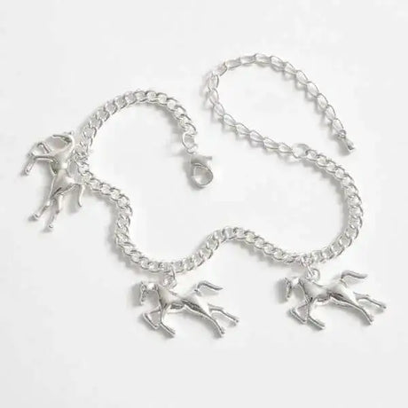 Silver effect horse themed bracelet with chain link design and three galloping horse riding themed charm pendants