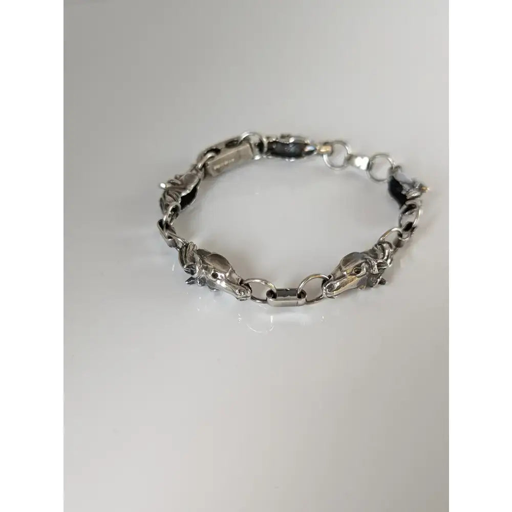 Silver steed 3d horse head bracelet featuring silver-toned horse head links for stylish equestrian jewelry look