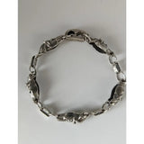 Silver toned steed 3d horse bracelet with detailed horse head links and polished oval chain segments in equestrian jewelry style