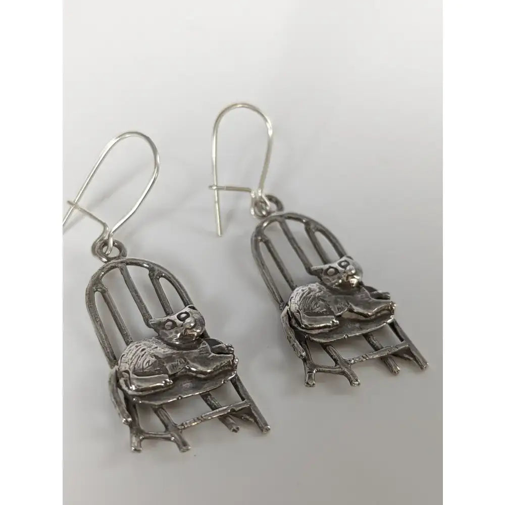 Silver steed handmade silver chair dropped earrings with intricate cat-in-a-chair design and polished finish