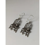 Silver steed handmade silver chair dropped earrings featuring cat on chair design with intricate metalwork and hook closure