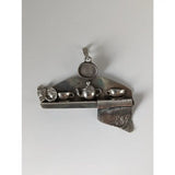 Silver steed cats shelf silver pendant featuring a metallic silver teapot and cup set with a cat figurine charm