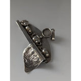 Silver steed cats shelf silver pendant with textured leaf base and miniature teapot and cup charms in silver tone