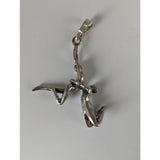 Silver steed acrobats sterling silver pendant with two intertwined acrobats in a dynamic pose