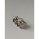Silver steed alarm clock stud earrings in silver tone shaped like miniature vintage steed alarm clocks
