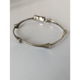 Silver steed sterling silver hoofnails bangle with sleek angular geometric segments and minimalist clasp design