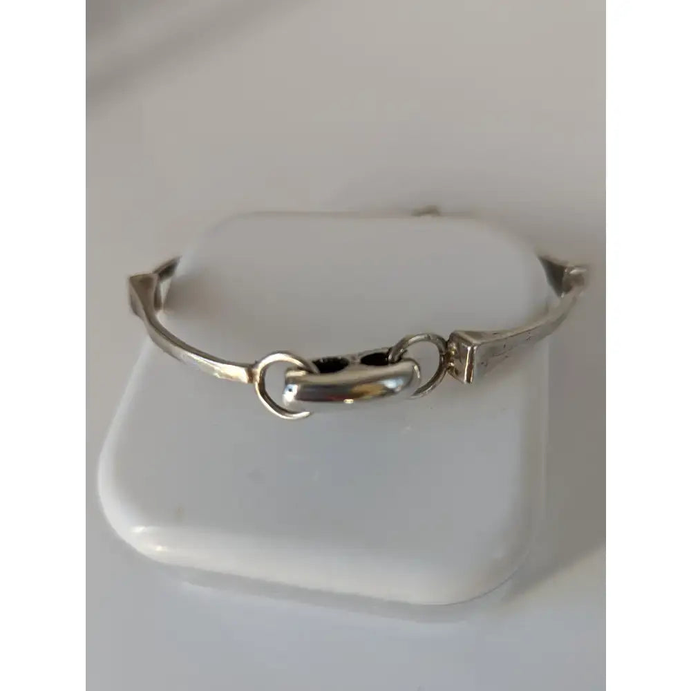 Silver steed sterling silver hoofnails bangle with a sleek silver-toned metal design and adjustable clasp