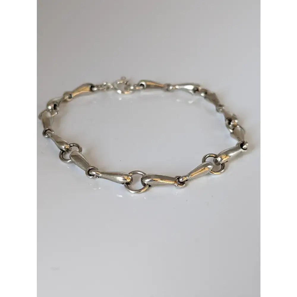 Silver steed snaffles bracelet with delicate silver horsebit link and polished metallic finish