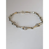 Silver steed snaffles bracelet with polished silver links and a secure clasp for a delicate silver look