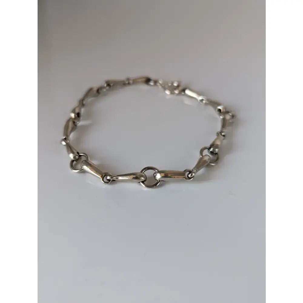 Silver steed snaffles bracelet with delicate silver horsebit style links and a secure clasp for everyday wear