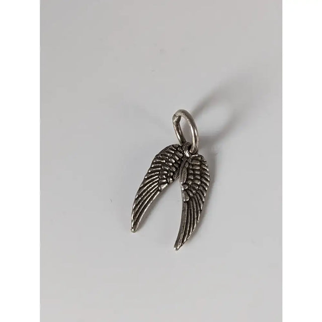Silver steed angel wings silver pendant featuring a detailed silver angel wing charm with a small loop at the top