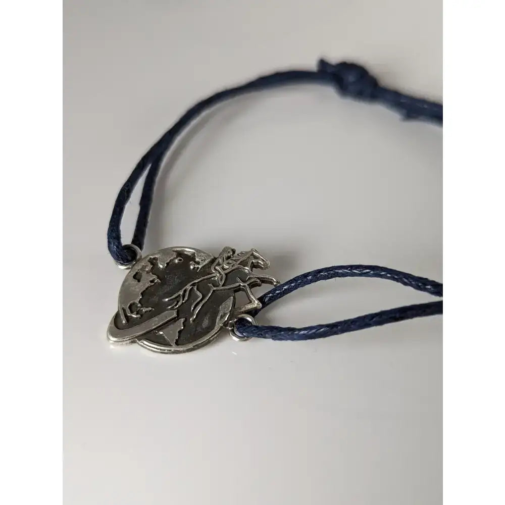 Silver steed world bracelet with silver globe charm and horse figure on dark blue braided cord for equestrian fans