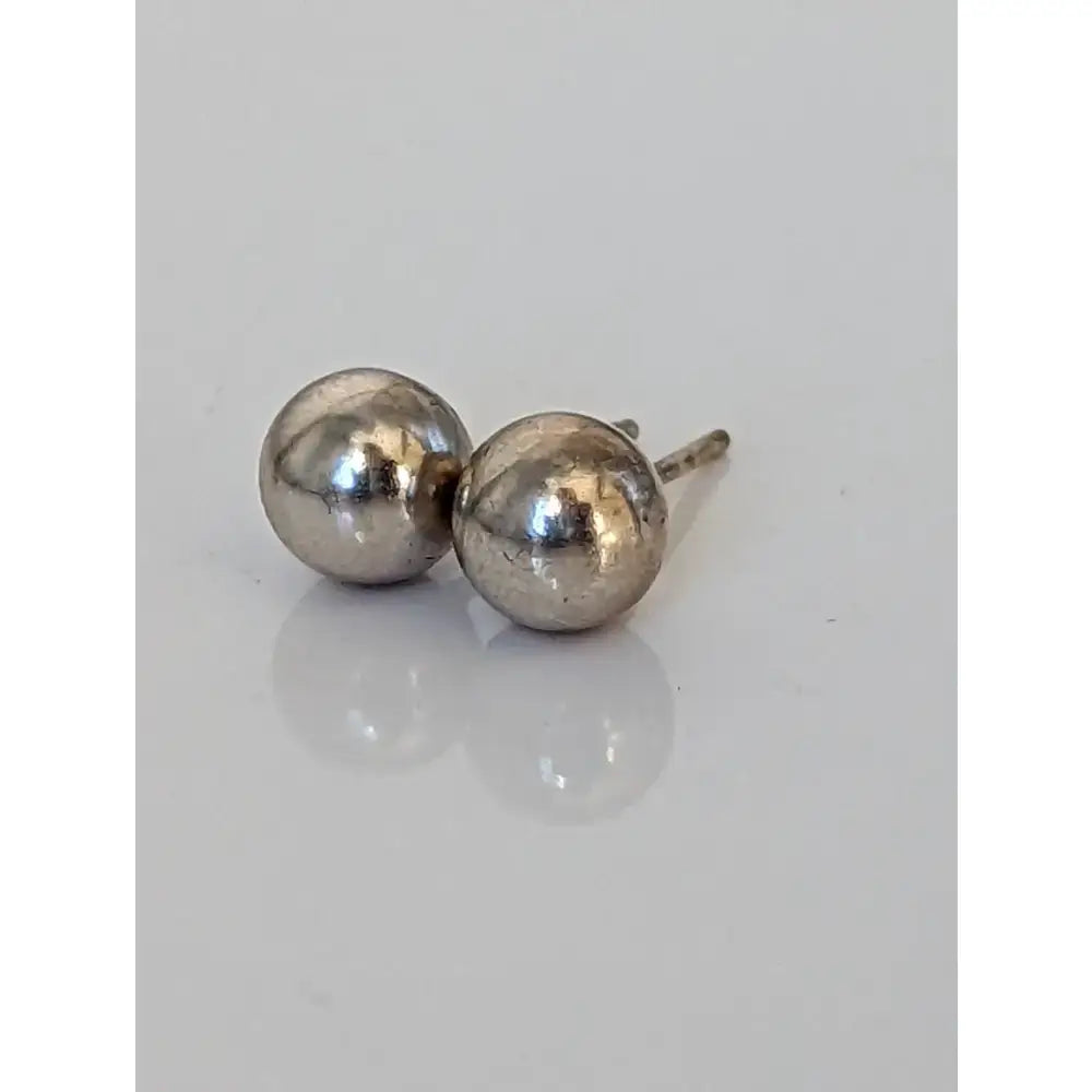 Silver steed balls stud earrings silver with polished reflective surface and simple post backs