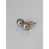 Silver steed balls simple round stud earrings silver with polished metallic finish for everyday wear