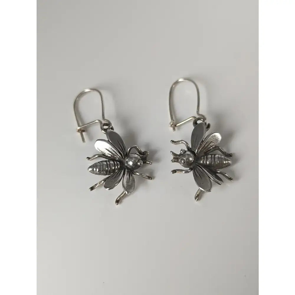 Silver steed bee dropped earrings with detailed wings and polished finish handmade silver jewelry perfect for equestrian jewelry fans