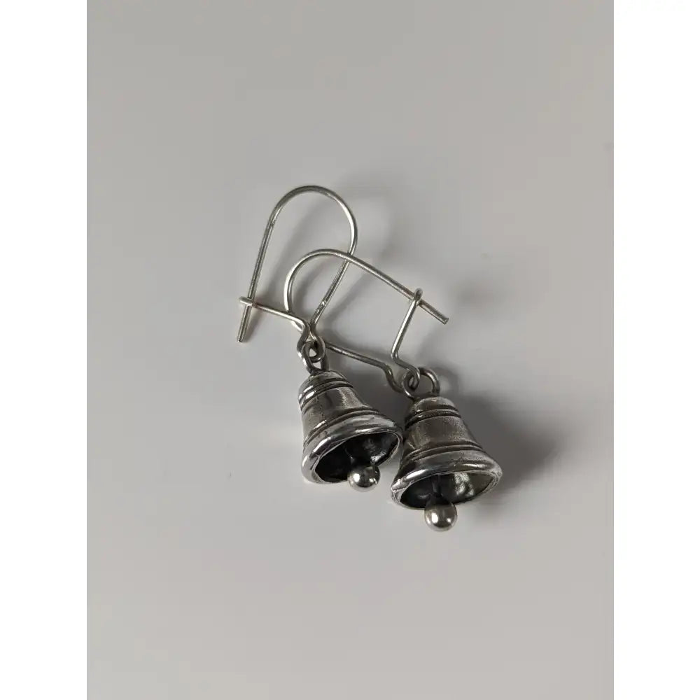 Silver steed bells handmade silver earrings with polished bell shapes and delicate wire hooks for stylish wear